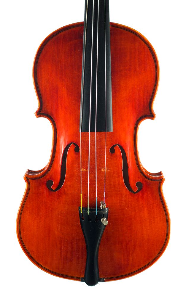 A violin, labelled Margaret Brindley