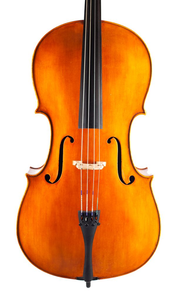 A cello, labelled Mathias Heinicke