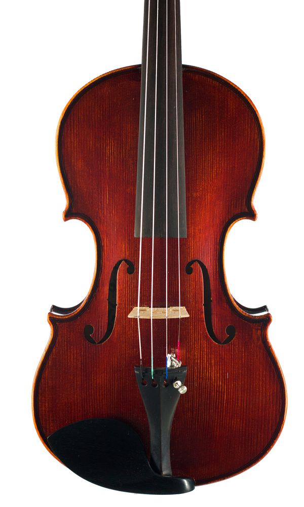 A half-sized violin, labelled Melcas