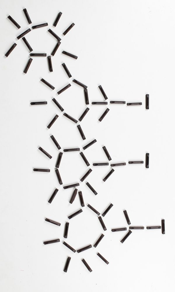 Seventy ebony violin bottom saddles