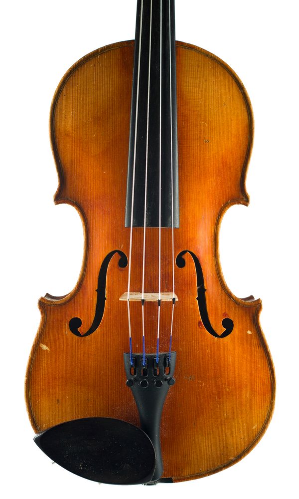 A violin, labelled Imported by Leslie Sheppard