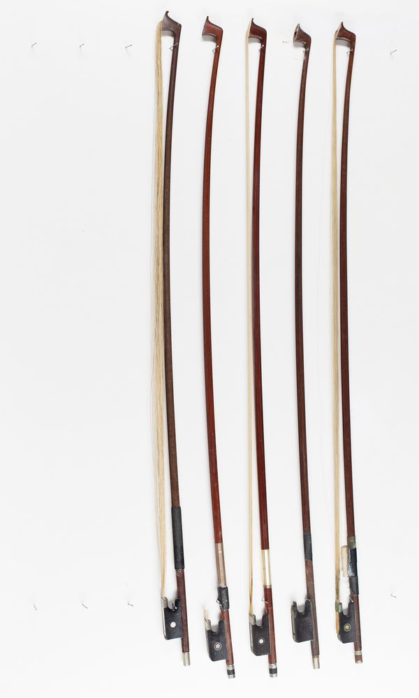 Four viola bows and one violin bow, various sizes