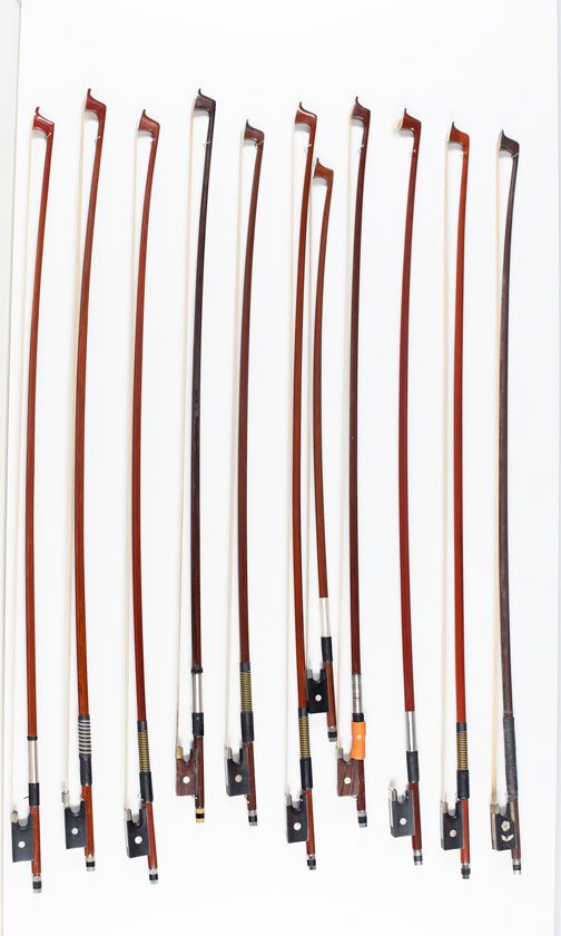 Twenty violin bows, various sizes