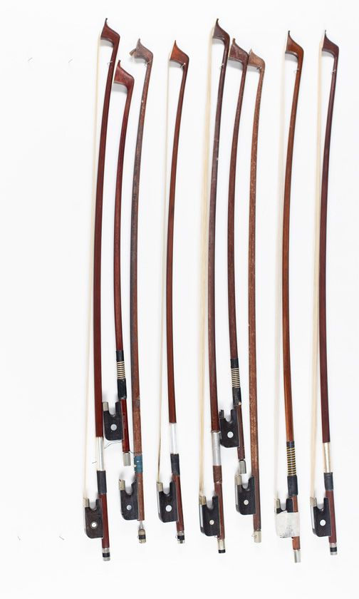 Nine cello bows, various sizes