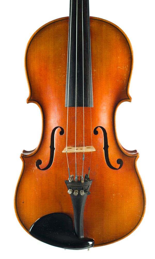 A violin, labelled Joan Carol. Klotz