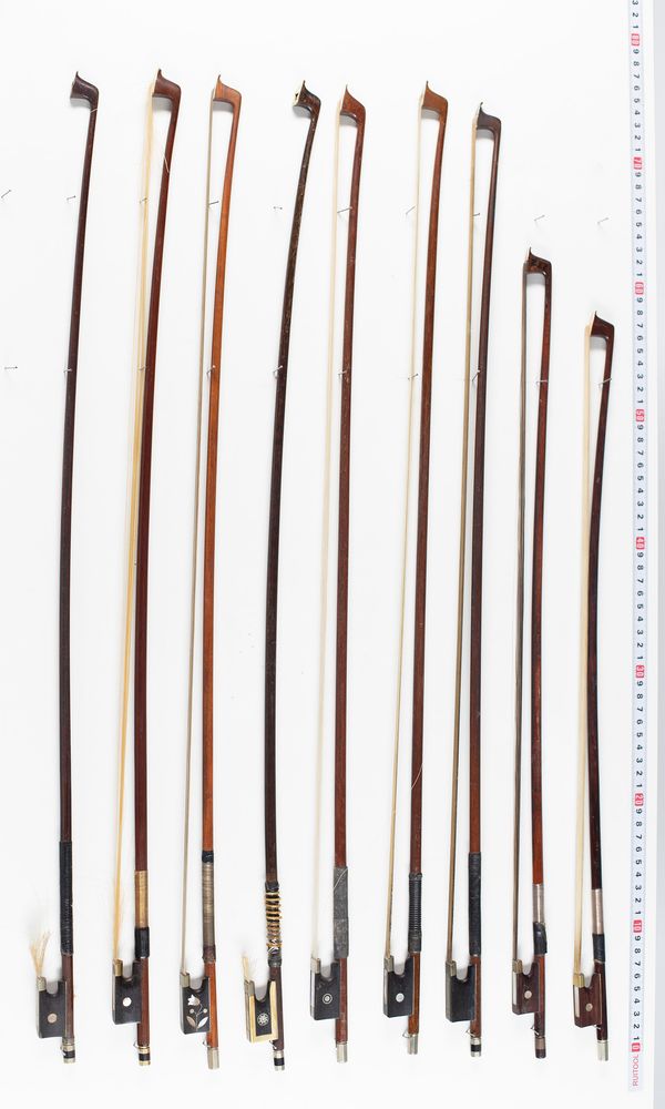 Nine violin bows, varying lengths