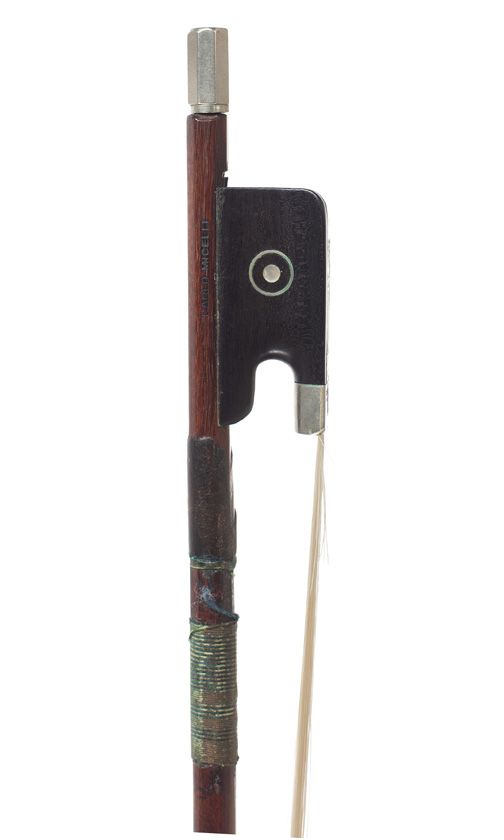 A nickel-mounted violin bow, stamped Carlo Micelli