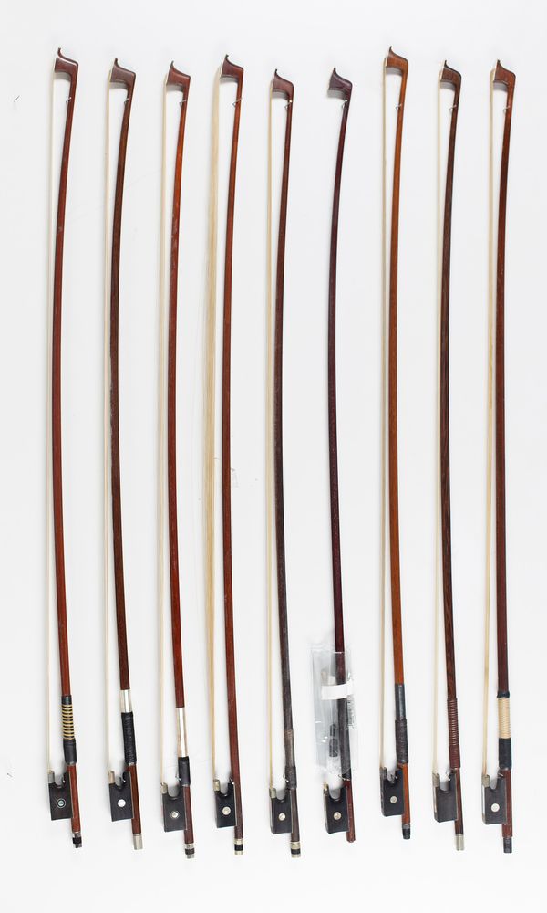 Ten violin bows, various sizes