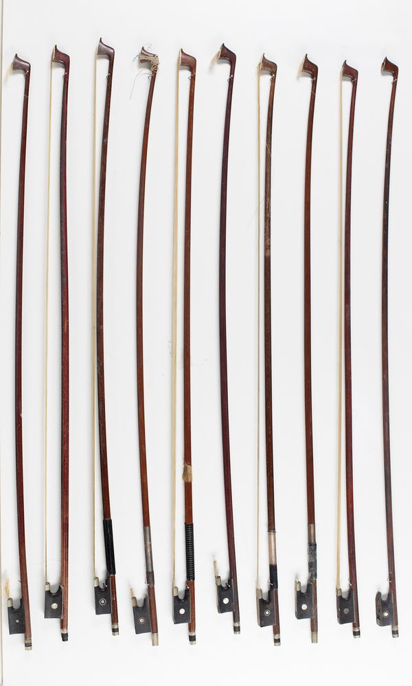 Ten violin bows, various sizes