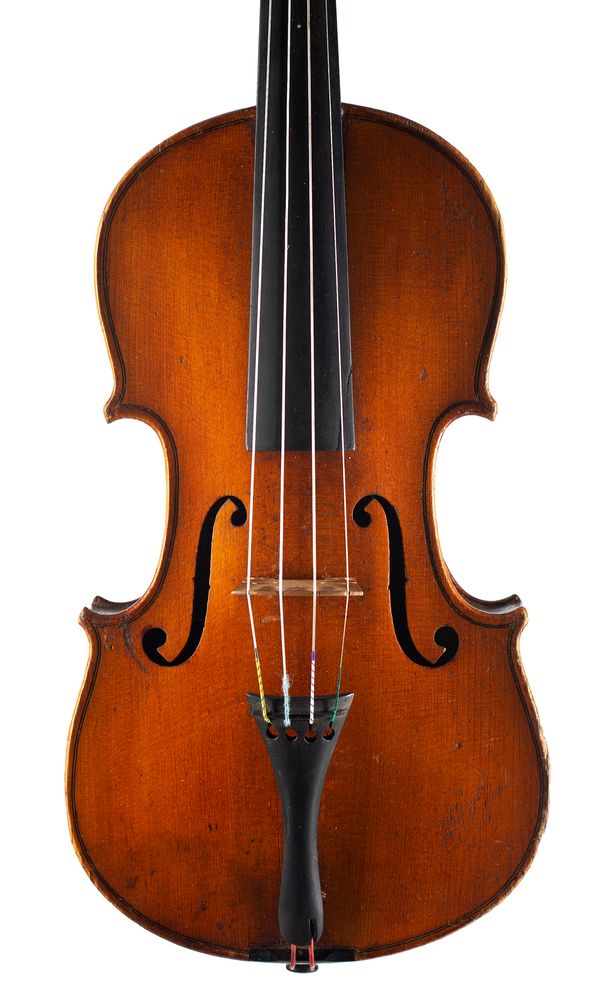 A small violin labelled Thomas Craig
