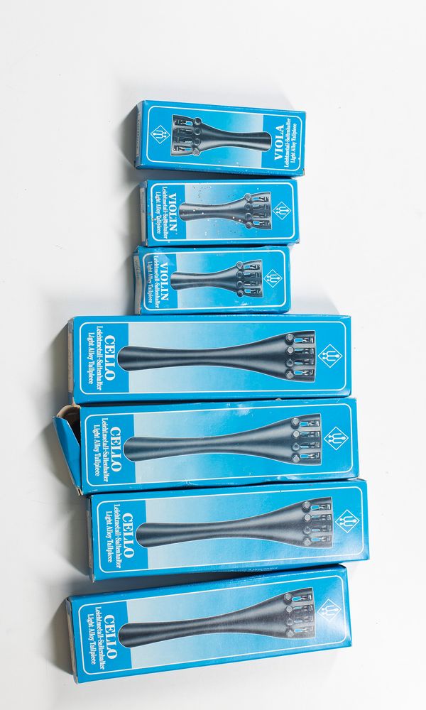 Seven tailpieces, various sizes