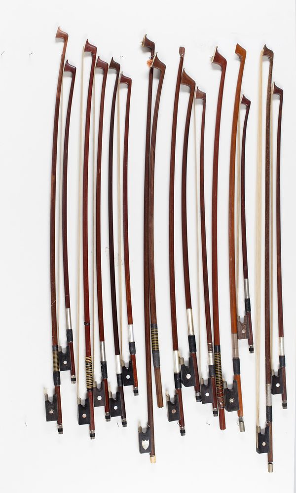 Fourteen cello bows and two bow sticks, varying lengths