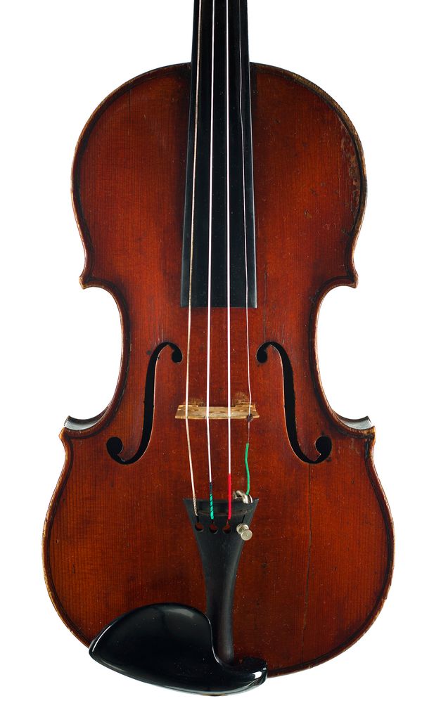 A violin, labelled N. Couturieux