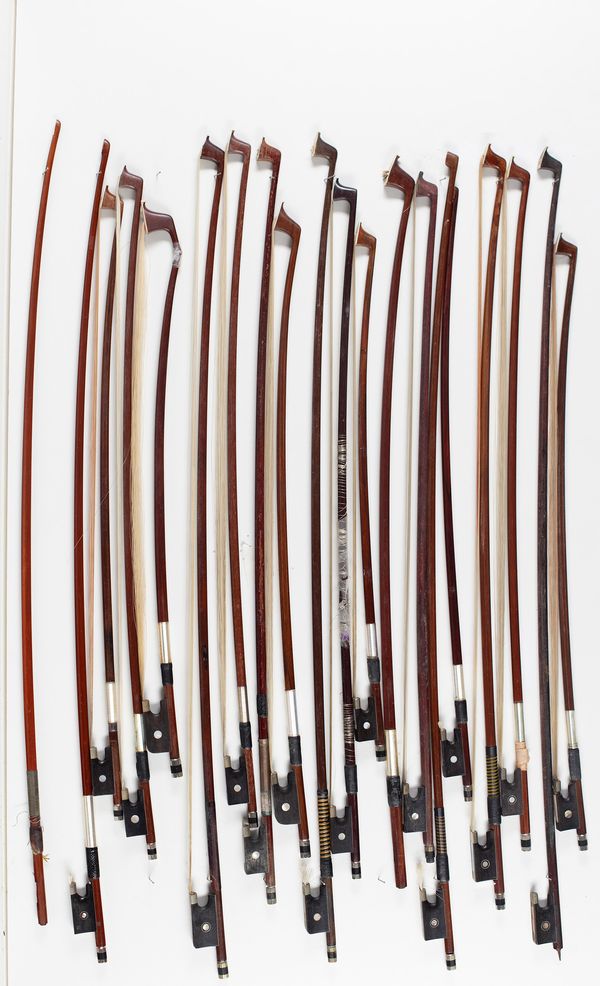 Fifteen violin bows, three cello bows and two bow sticks, varying lengths