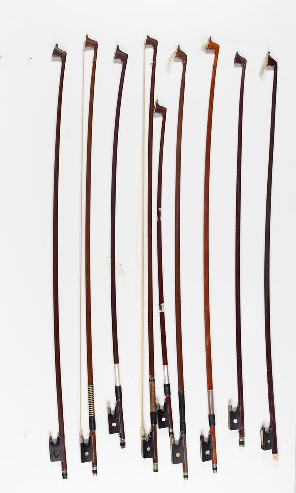 Nine violin bows, varying lengths