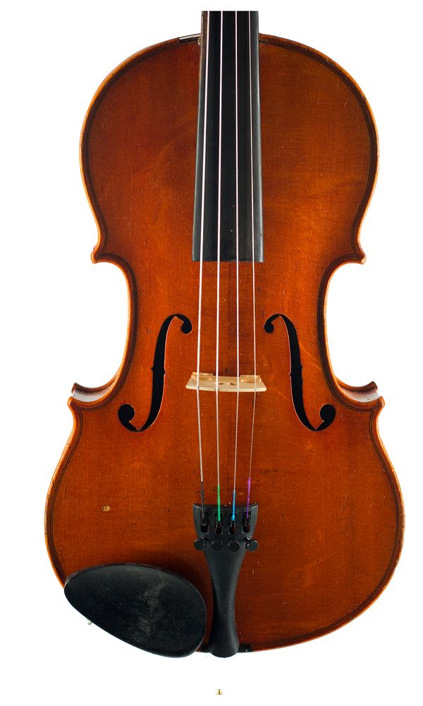 A three-quarter sized violin, branded Charles