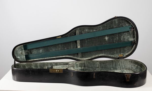A black W. E. Hill & Sons violin case
