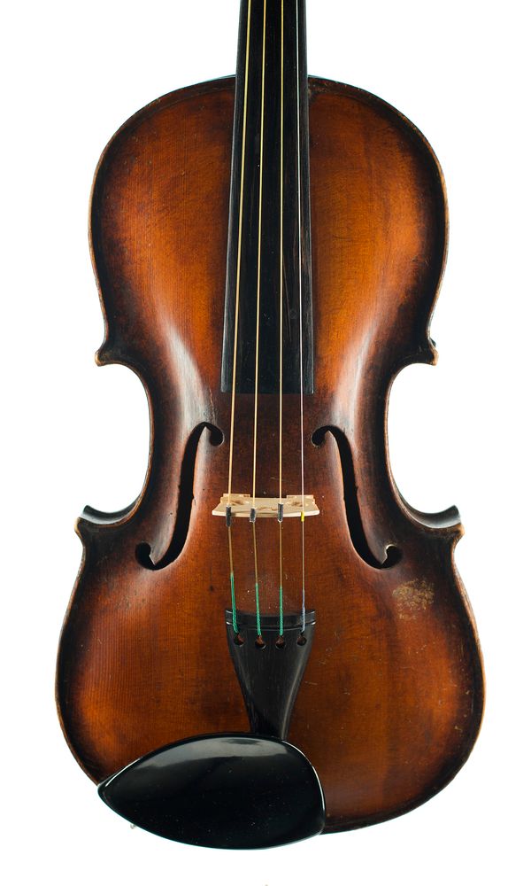 A three-quarter sized violin labelled Stainer