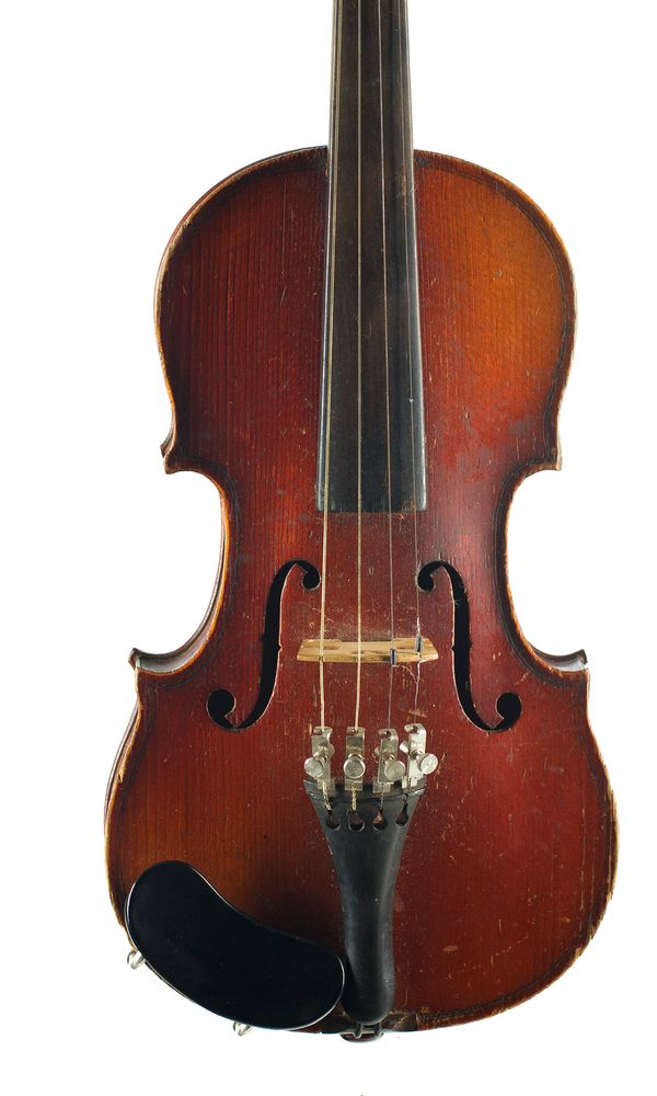 A tiny little violin, labelled Medio Fino