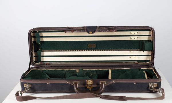 A violin case, branded Musafia