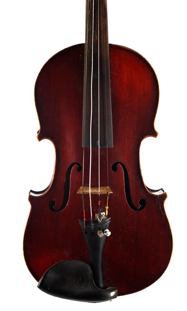 A child's violin labelled Medio Fino