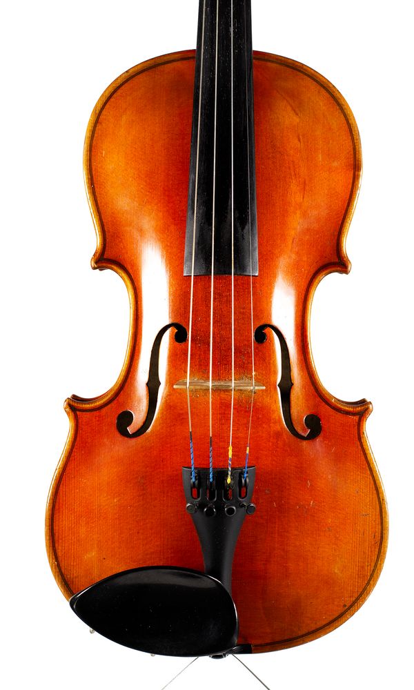 A violin, labelled Schuster & Co.