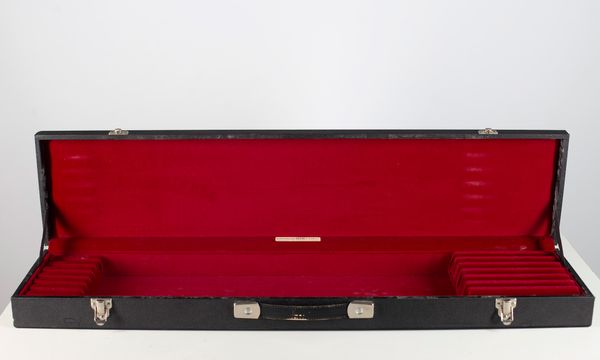 A six-slot bow case, branded Kingham MTC