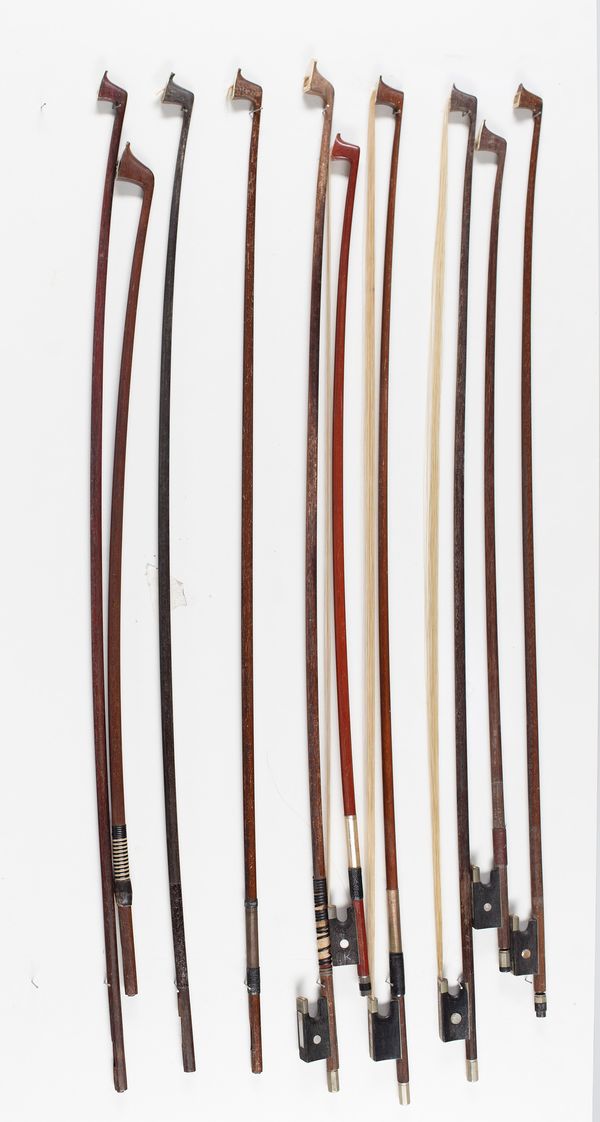 Six violin bows and four bow sticks, varying lengths