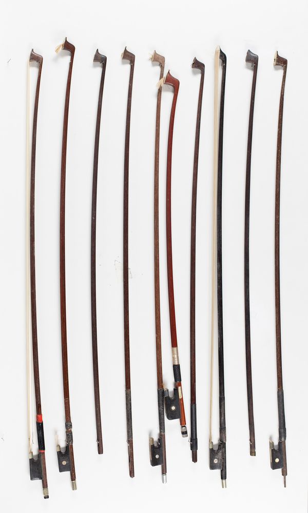 Five violin bows, a cello bow and four bow sticks, varying lengths