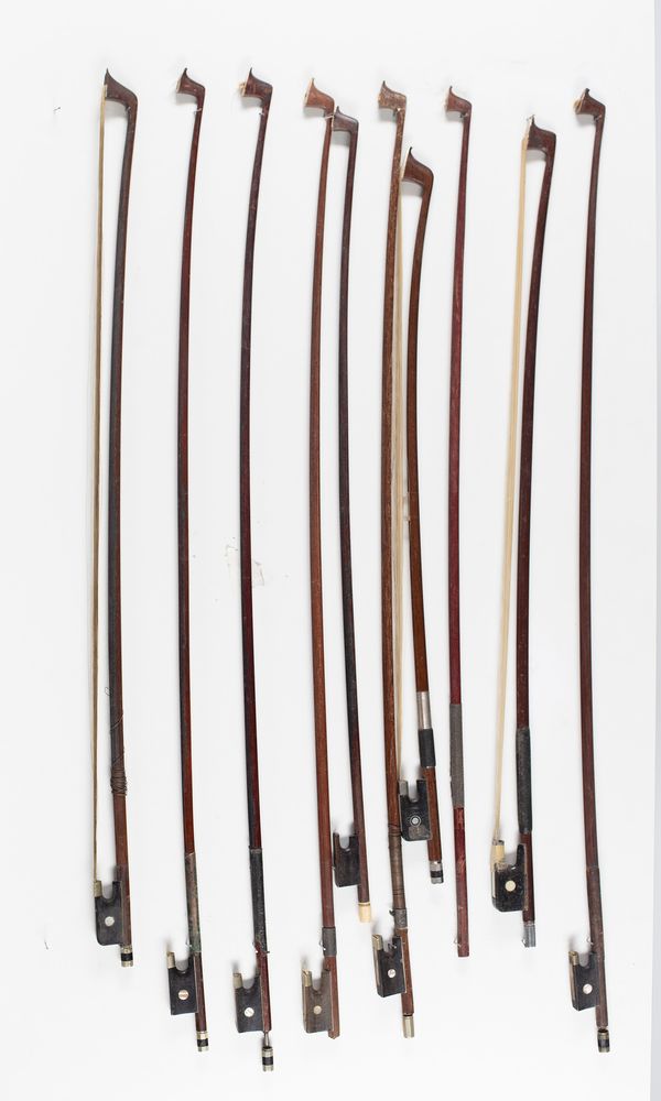 Seven violin bows, two cello bows and a bow stick, varying lengths