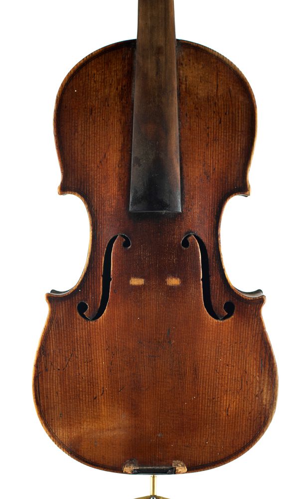 A violin, labelled Thomas Cole