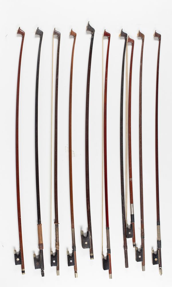 Six violin bows, three cello bows and a bow stick, varying lengths