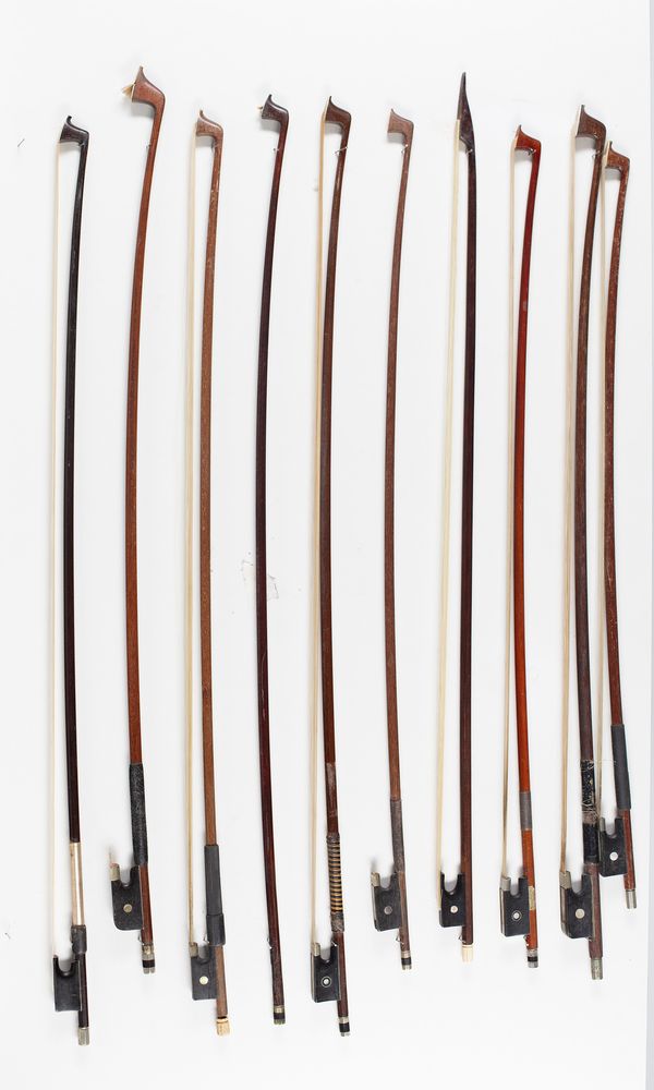 Seven violin bows, two cello bows and a bow stick, varying lengths