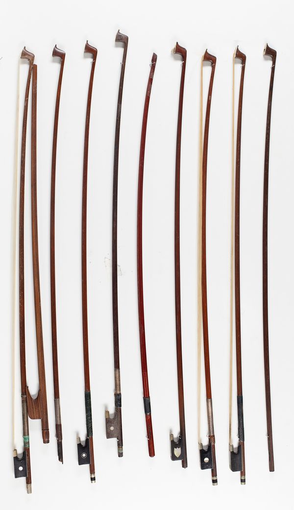 Six violin bows and four sticks, varying lengths