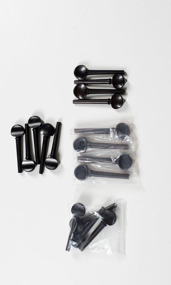 Four sets of three-quarter size cello pegs