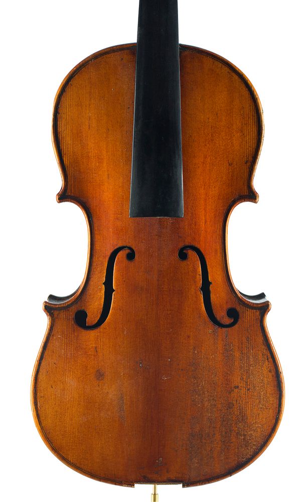 A half-sized violin, labelled Manufactured in Bohemia