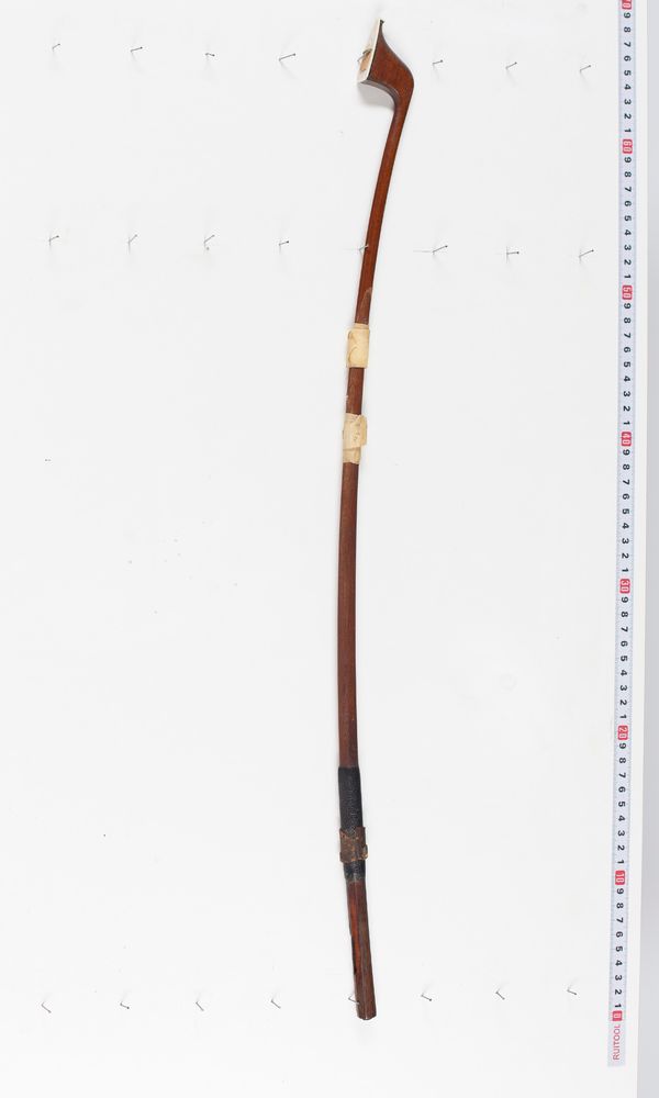 An unmounted bass bow, branded Emile Ouchard