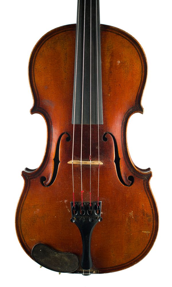 A violin, labelled Hawkes & Sons