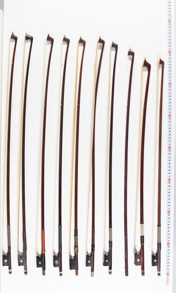 Twenty-two violin bows, two cello bows and two bow sticks, varying lengths