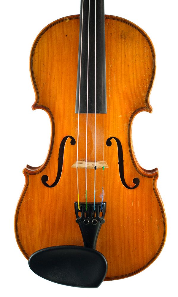 A three-quarter sized violin, labelled Copie de Antonius Stradiuarius