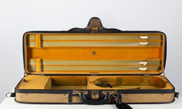 A violin case branded M. A. Gordge