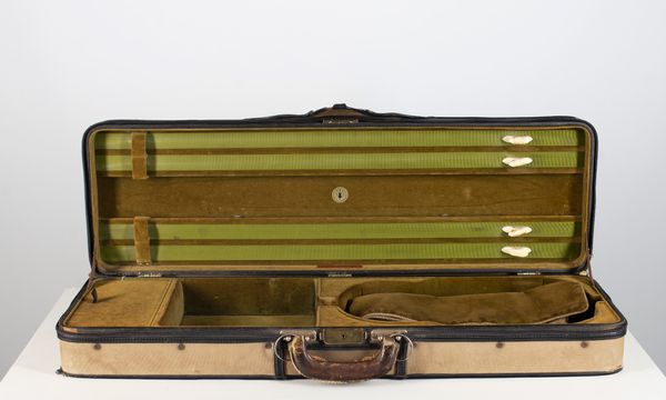 A violin case branded J. P. Guivier & Co Ltd