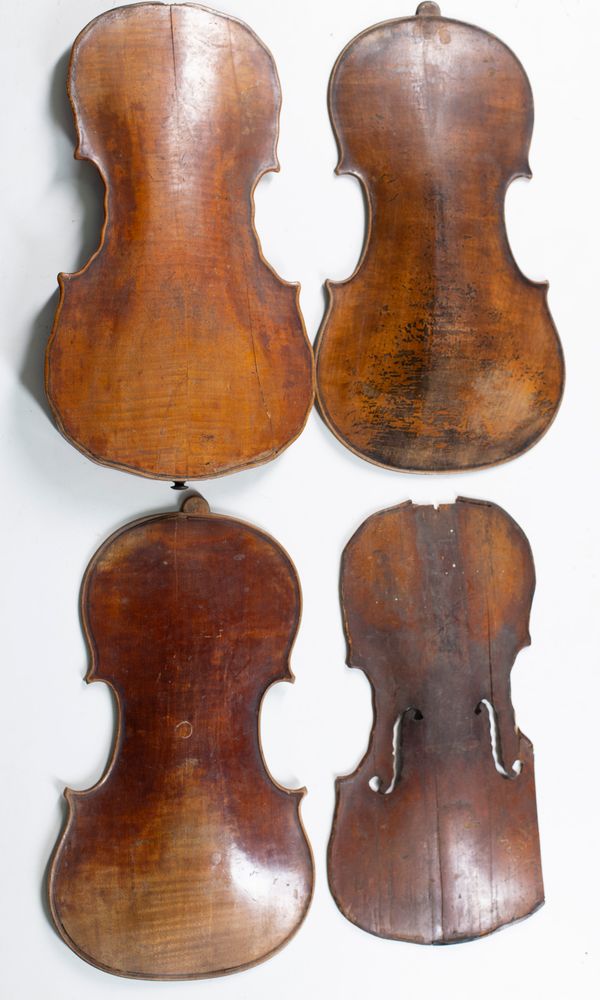 Three violin backs and one front