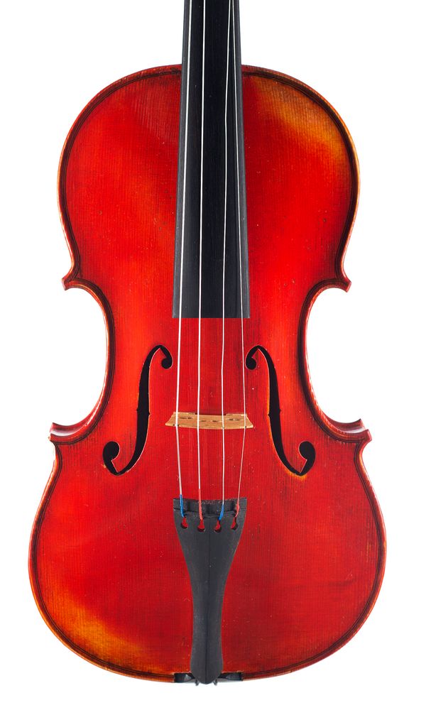 A violin, labelled Lucien Schmitt