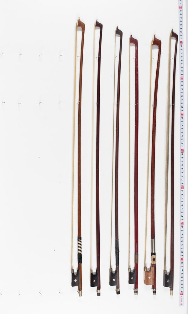 Five violin bows and one cello bow, varying lengths