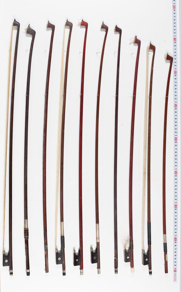 Seven violin bows, two cello bows, one bass bow, three violin sticks and one cello stick, varying lengths