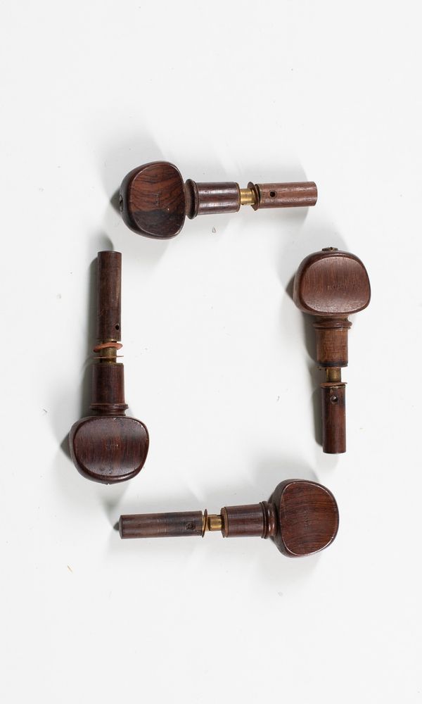 Four cello pegs