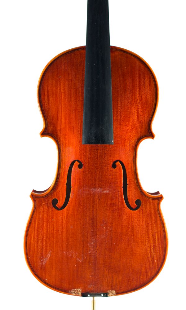 A three-quarter sized violin, partially labelled