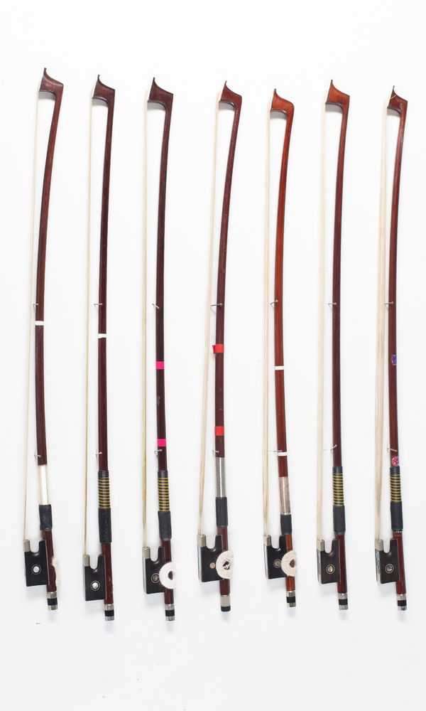 Seven child violin bows, varying lengths