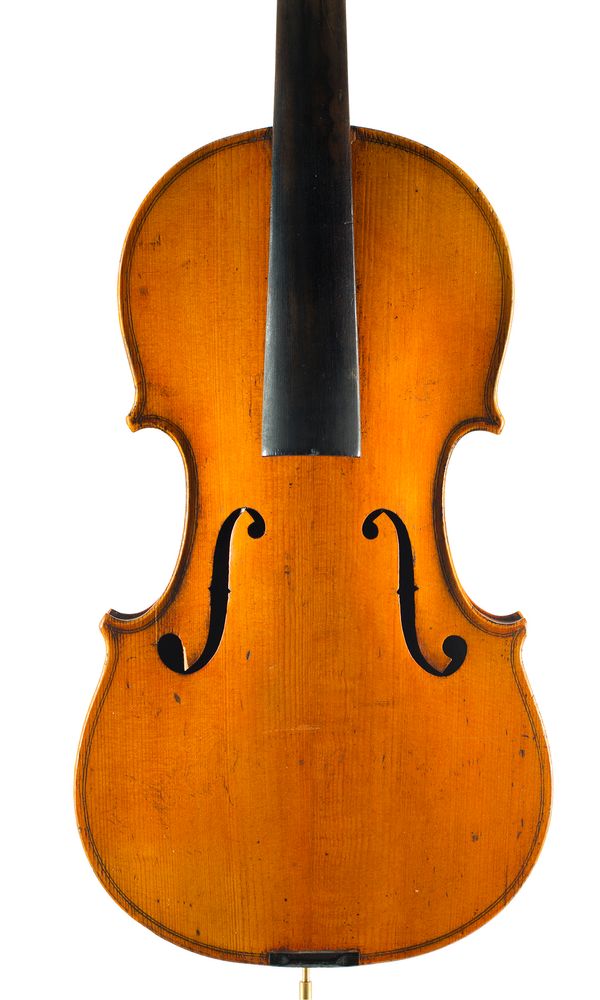 A violin, labelled Medio Fino